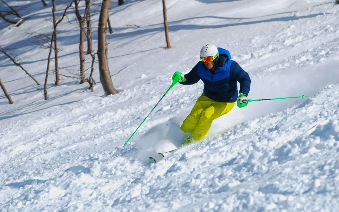 Skier in Powder skiing with Slalom Skis